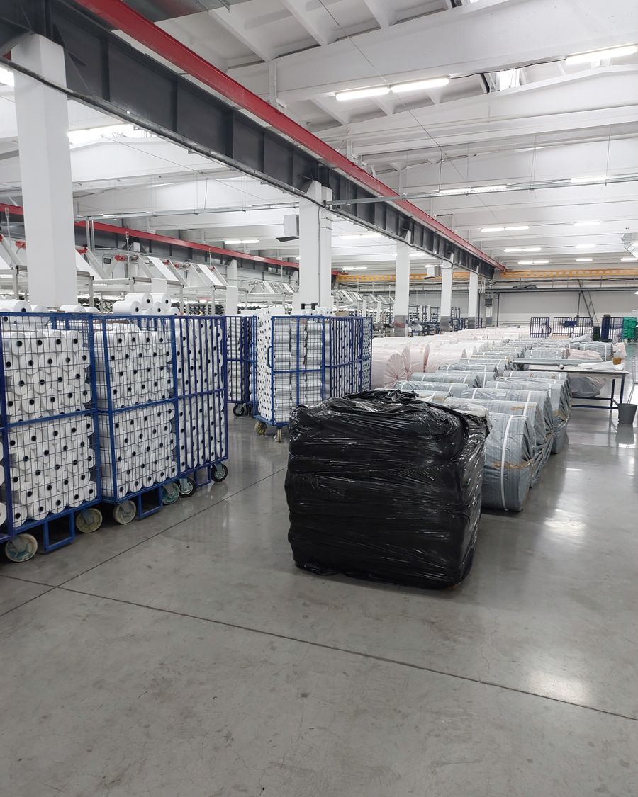 Warehouse with wrapped and palletised goods ready for shipment