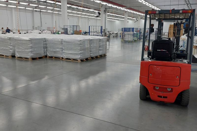 Palletised goods in a warehouse with forklift